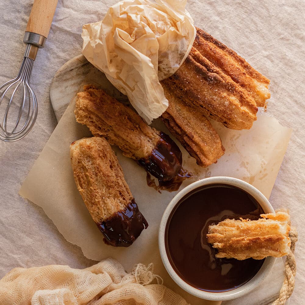 Porras con chocolate en Mambo y Ollas GM